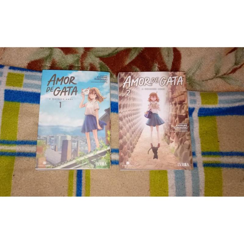 Dos tomos del manga (amor de gata)