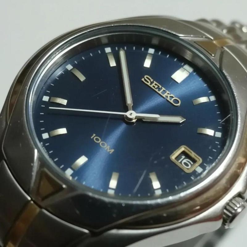 Reloj Seiko Hombre Con Caja Acero Combinado 100m Calendario