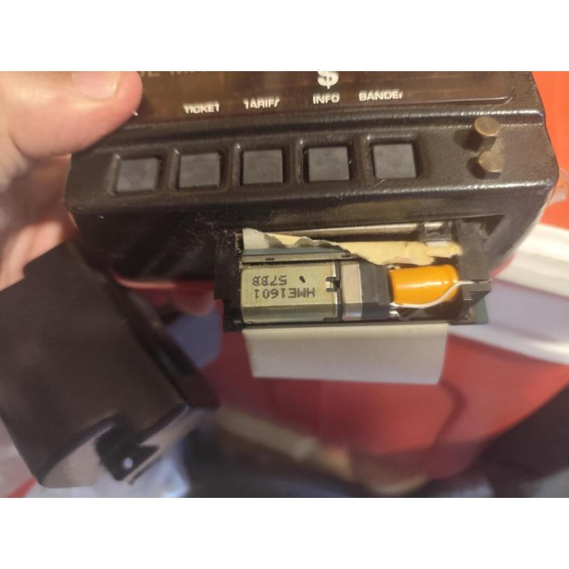 reloj de taxi con tiquetera usado