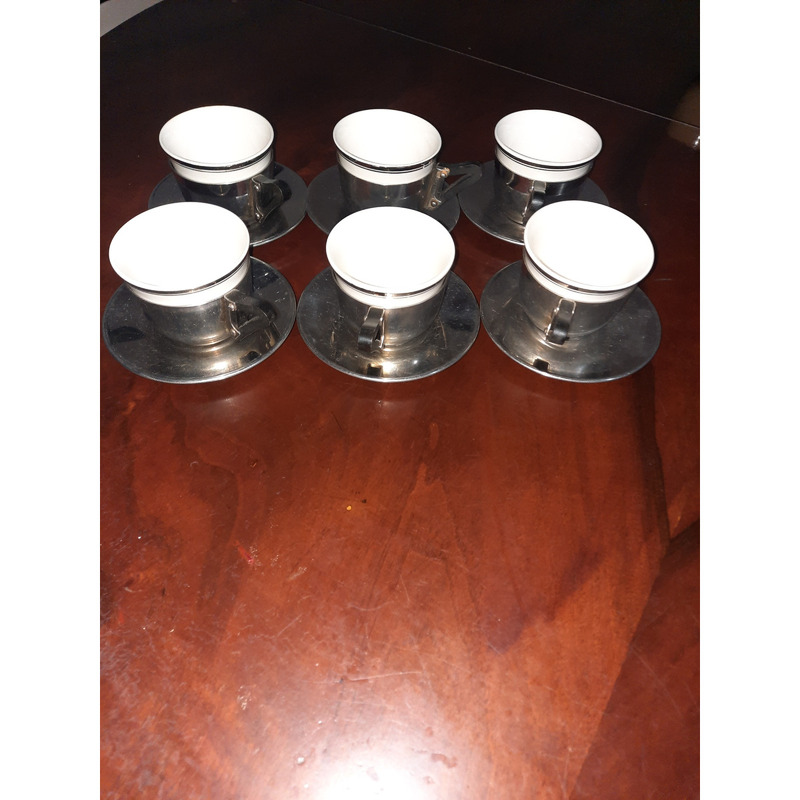 Juego de porcelana de cafe con base de acero inoxidable