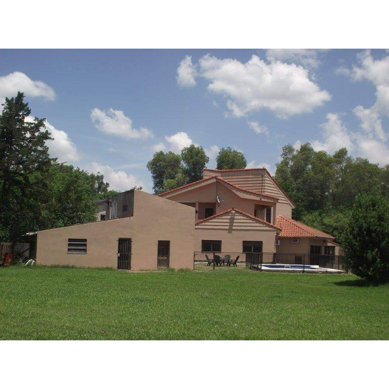 Casa con dos terrenos