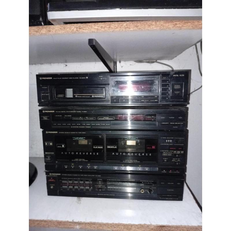 Pioneer( centro musical - formado por cuatro bloquesradio casete cd amplificador