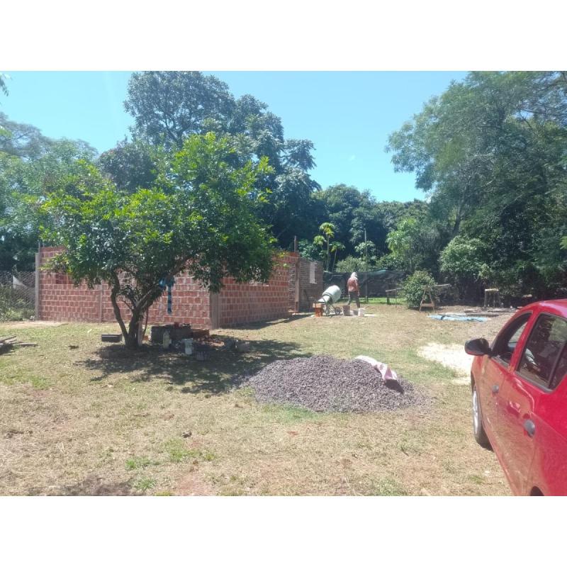 Terreno con casa a terminar