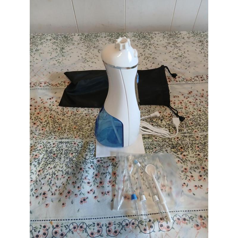 Irrigador dental para brackets