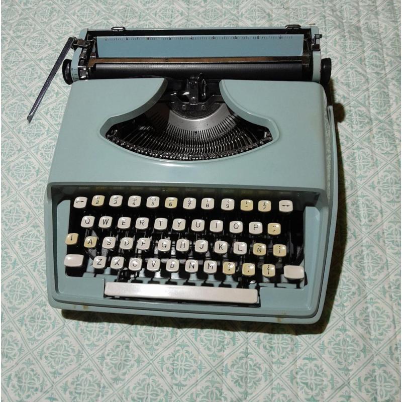 MAQUINA DE ESCRIBIR REMINGTON, Made in Italy, color celeste, con tapa rigida